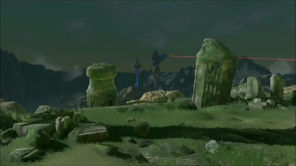 Broken stone columns on the ridge with the shrine far beyond