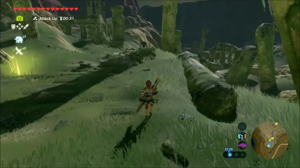 Link climbing a grassy ridge toward distant ruined columns