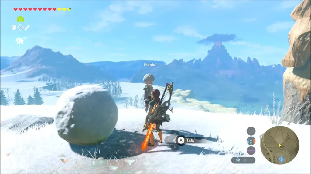 The snowball waiting at the top of the slope next to Pondo The snowball waiting at the top of the slope next to Pondo