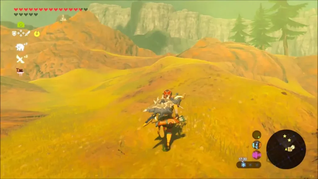 Link crossing a grassy ridge with cliffs and Death Mountain ahead Link crossing a grassy ridge with cliffs and Death Mountain ahead