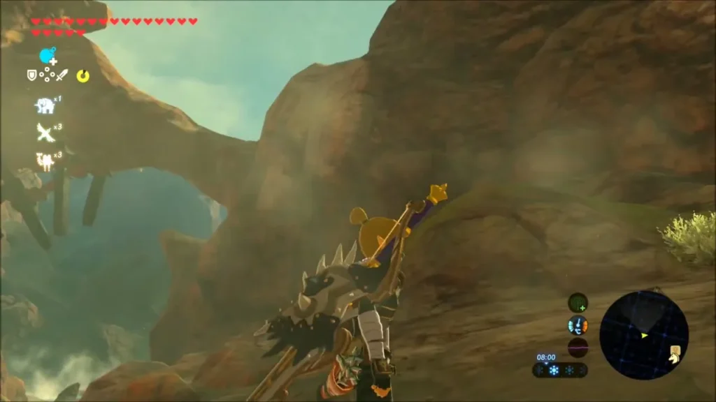 Link gazing at a small rock arch on the mountainside across the valley Link gazing at a small rock arch on the mountainside across the valley