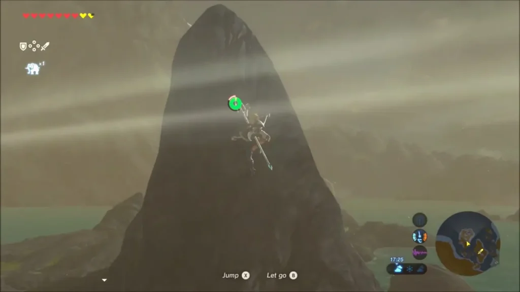 Link climbing the tall rock spire in the middle of the lagoon Link climbing the tall rock spire in the middle of the lagoon