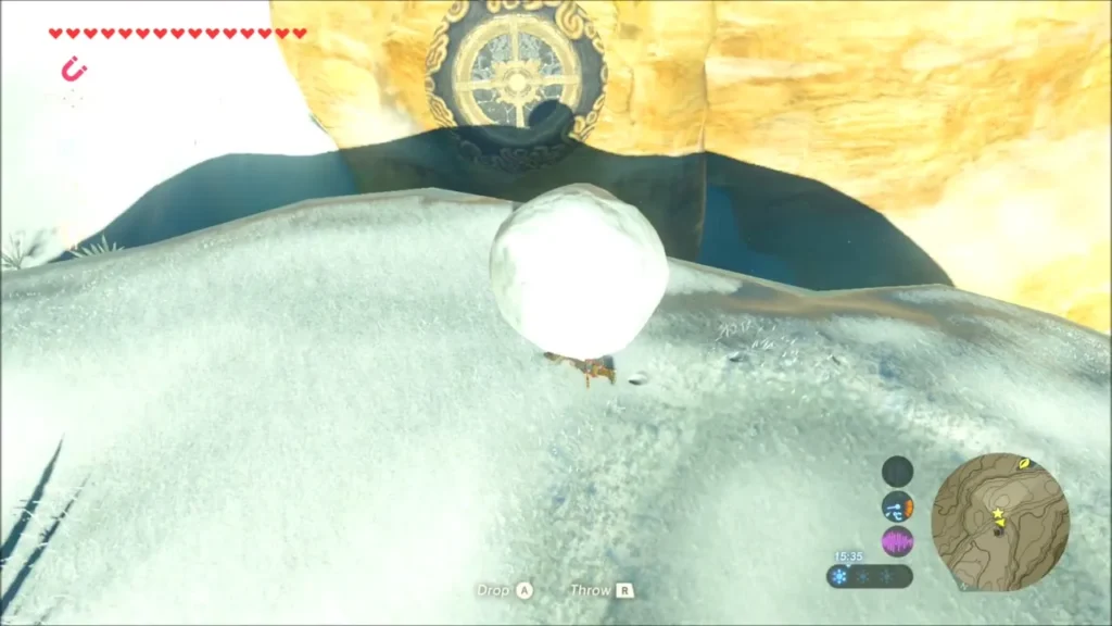 Snowball held up so its shadow falls across the glowing pedestal Snowball held up so its shadow falls across the glowing pedestal