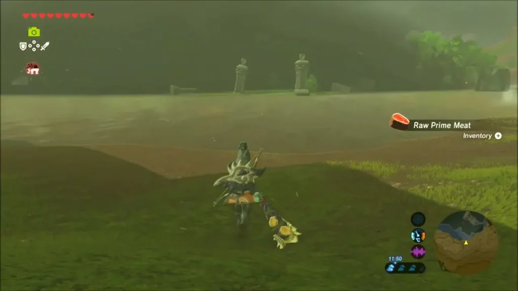 Link riding toward the ruined gate pillars of Thyphlo Ruins across a misty valley Link riding toward the ruined gate pillars of Thyphlo Ruins across a misty valley