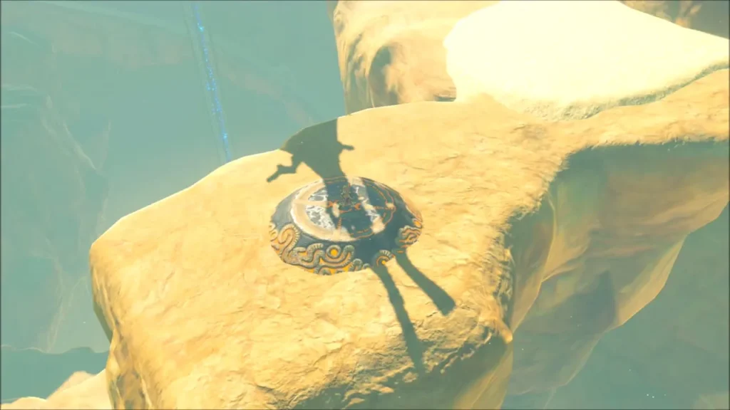 Link standing on the round Sheikah platform at midday Link standing on the round Sheikah platform at midday
