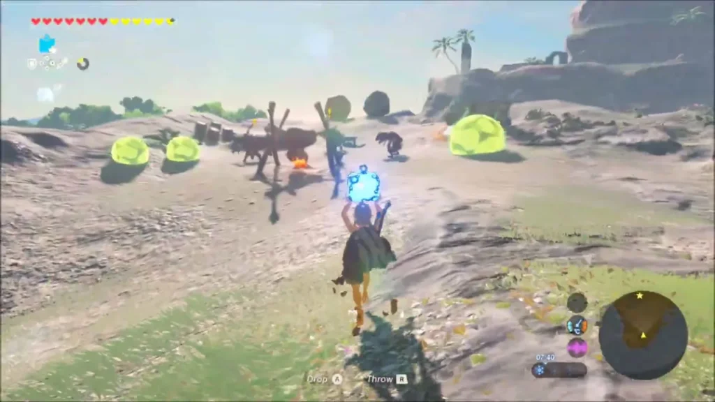Link carrying the glowing orb toward a Bokoblin camp with Chuchu jellies Link carrying the glowing orb toward a Bokoblin camp with Chuchu jellies