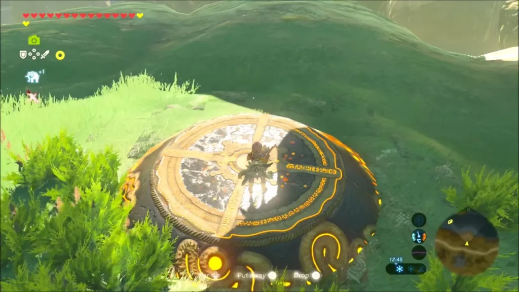 Link standing on the shrine pad holding a flame near midday Link standing on the shrine pad holding a flame near midday