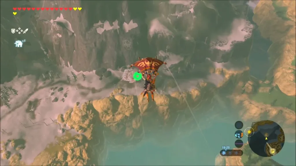 Link paragliding over a snowy mountain ridge Link paragliding over a snowy mountain ridge