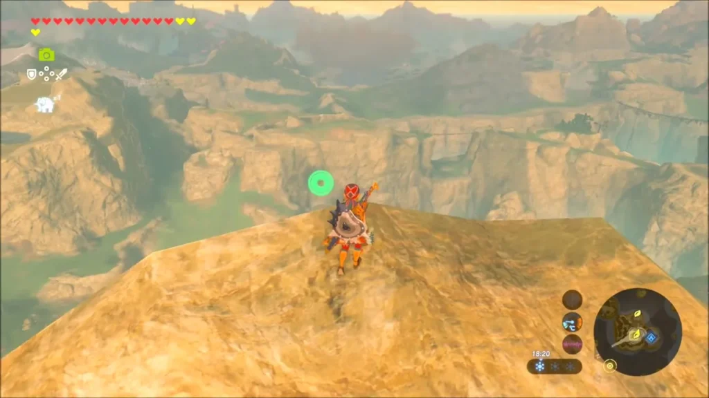 Link reaching the top of the rocky peak with canyons behind Link reaching the top of the rocky peak with canyons behind