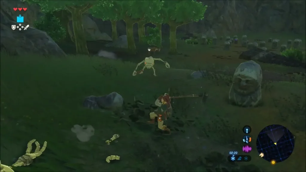 Link fighting a skeleton beside a carved stone statue Link fighting a skeleton beside a carved stone statue