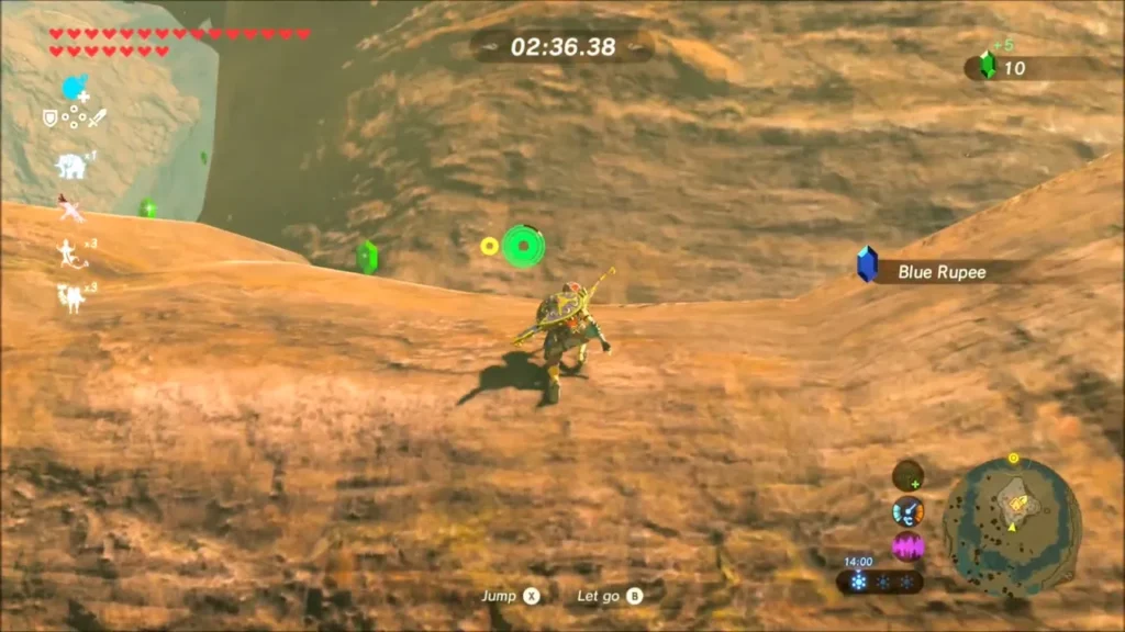 Link climbing the rock wall past a blue rupee Link climbing the rock wall past a blue rupee