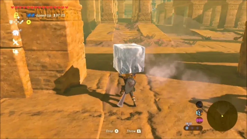Link hauling the ice block past sandstone pillars in the ruins Link hauling the ice block past sandstone pillars in the ruins