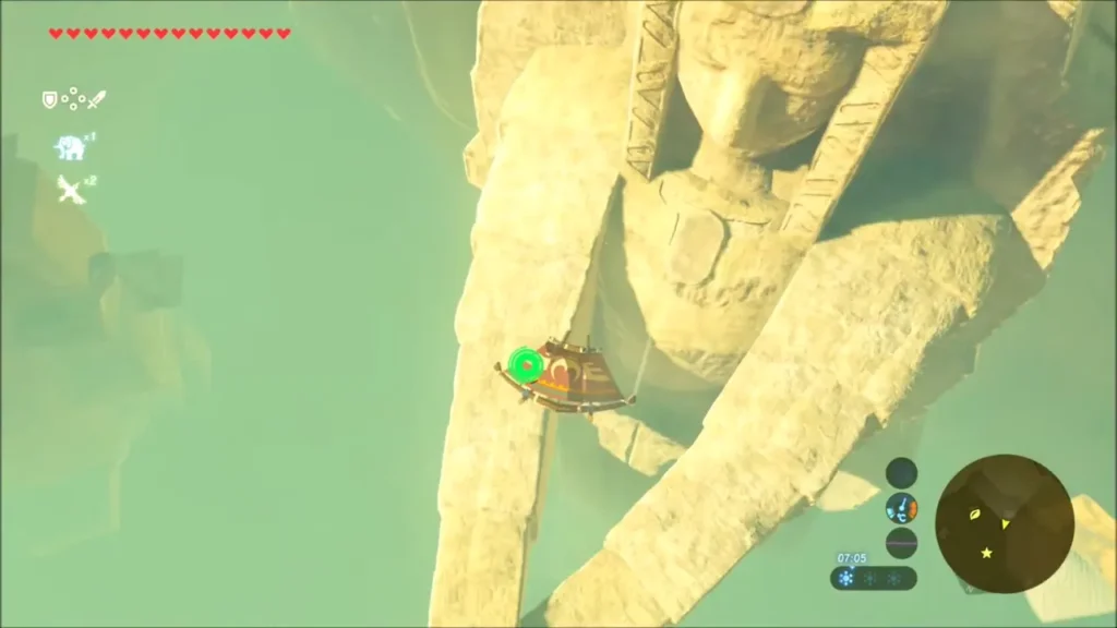 Link gliding past a giant heroine statue in the East Gerudo Ruins Link gliding past a giant heroine statue in the East Gerudo Ruins