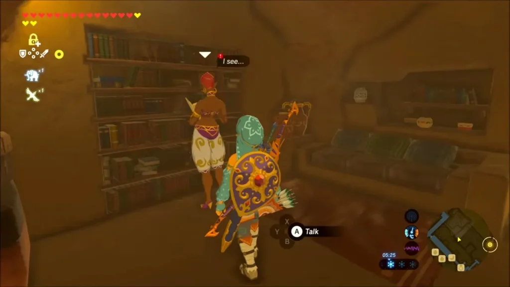Link meeting Rotana beside her bookshelves in her home Link meeting Rotana beside her bookshelves in her home