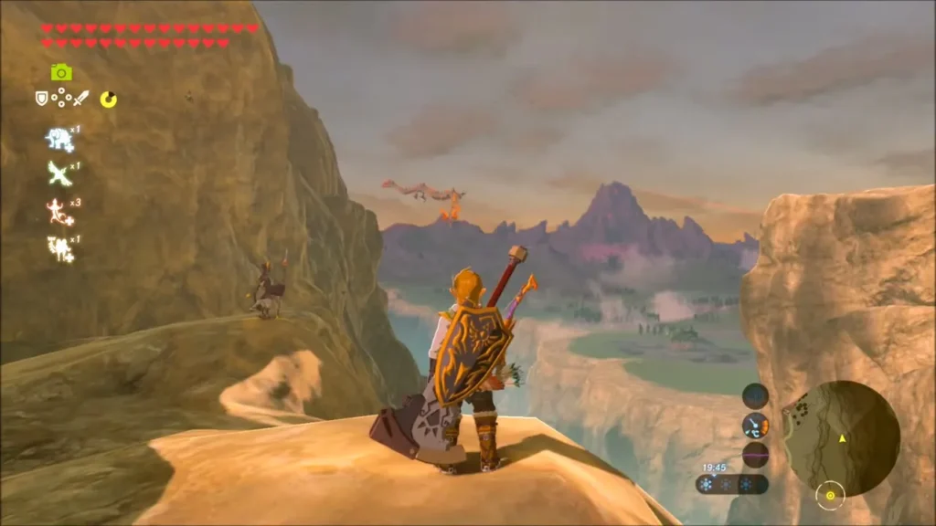 Link on a cliff ledge watching Dinraal fly over the distant canyon Link on a cliff ledge watching Dinraal fly over the distant canyon