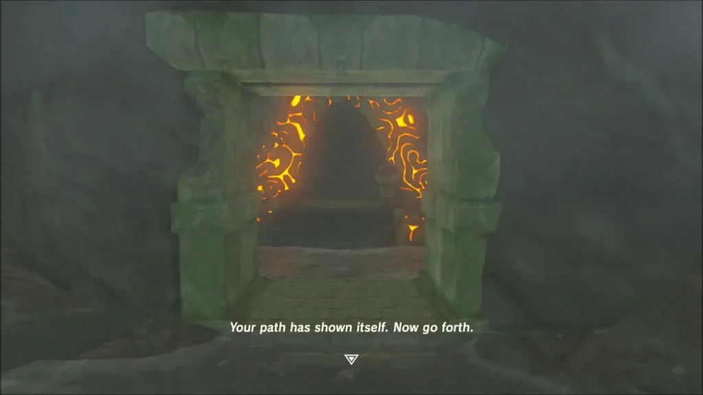 Glowing orange entrance of the hidden shrine revealed beside the spring Glowing orange entrance of the hidden shrine revealed beside the spring