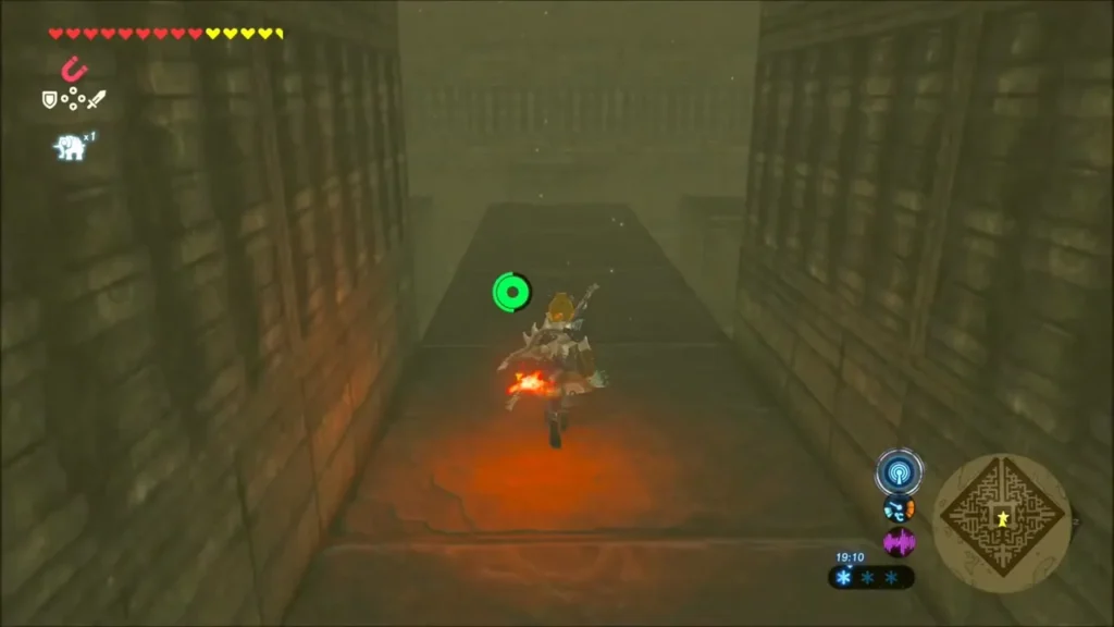 Link walking down a narrow stone corridor in the labyrinth toward the shrine Link walking down a narrow stone corridor in the labyrinth toward the shrine