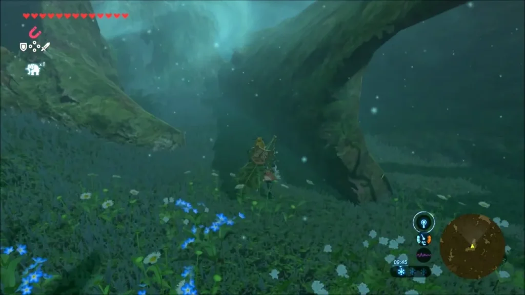 Link standing at the mouth of a huge hollow log among blue flowers Link standing at the mouth of a huge hollow log among blue flowers