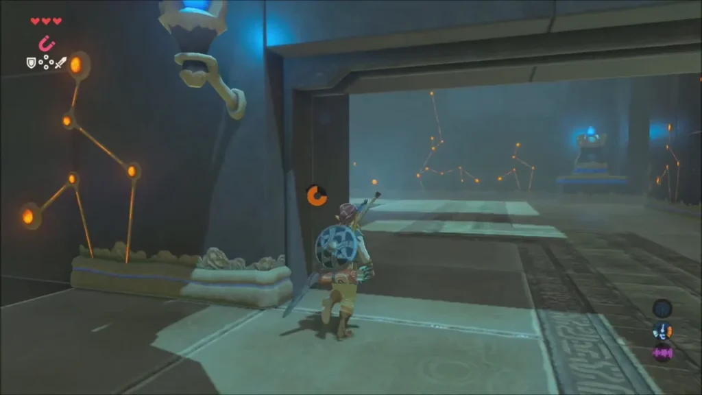 Link at an open doorway leading through the drained shrine Link at an open doorway leading through the drained shrine
