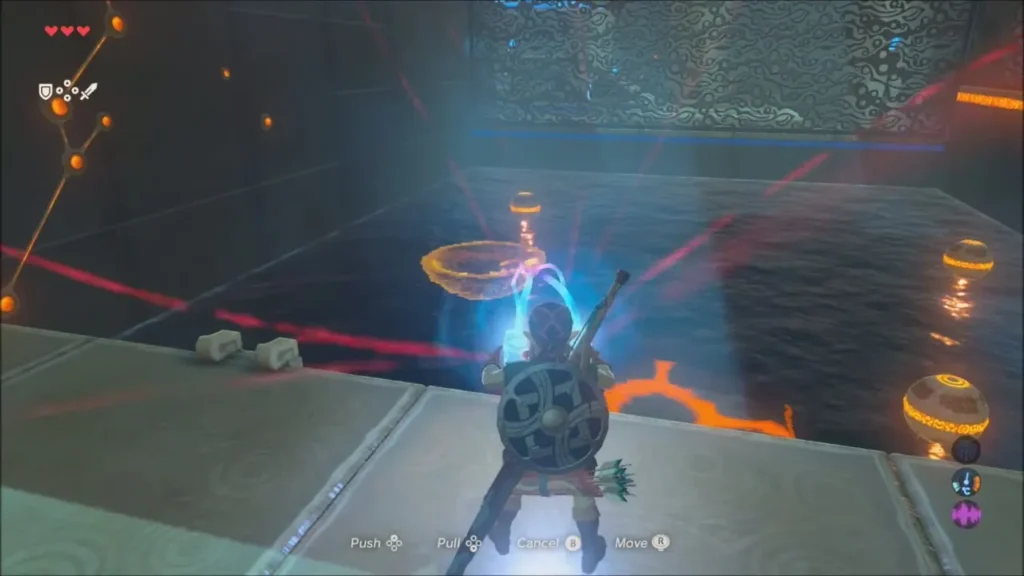 Link using Magnesis to scoop a sphere with the metal bowl Link using Magnesis to scoop a sphere with the metal bowl