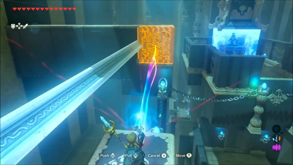 Link pulling a large metal block along its rail with Magnesis in Dako Tah Shrine Link pulling a large metal block along its rail with Magnesis in Dako Tah Shrine