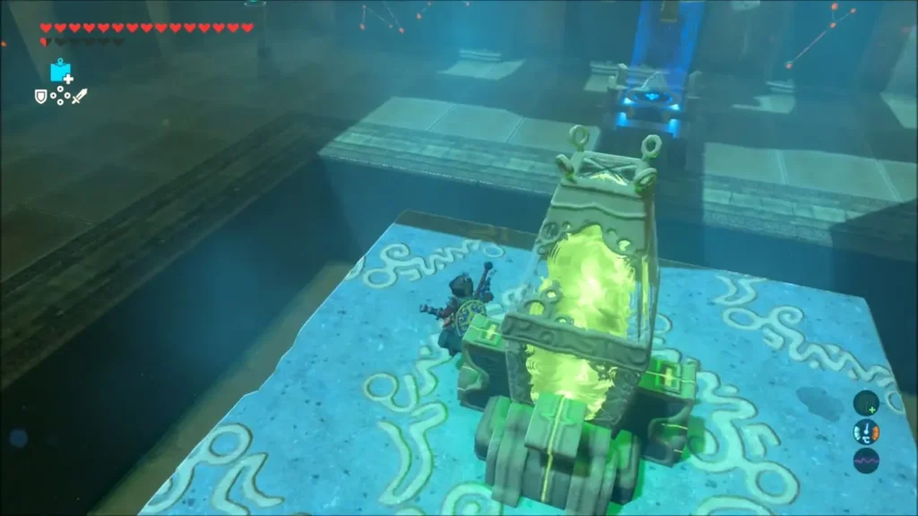 Link standing on top of the stone block beside the glowing terminal