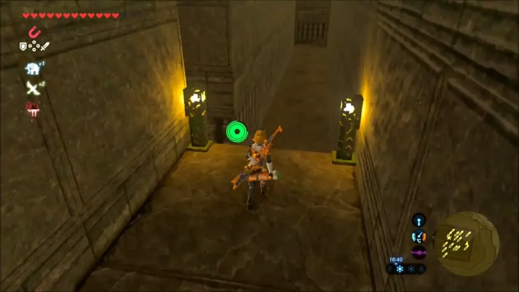 Link walking a sandy labyrinth corridor lit by two torches