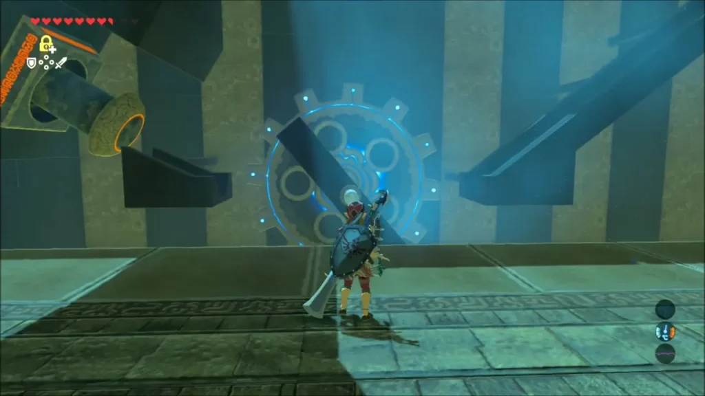 Link facing the Stasis cogwheel and tilted platform in Dunba Taag Shrine Link facing the Stasis cogwheel and tilted platform in Dunba Taag Shrine