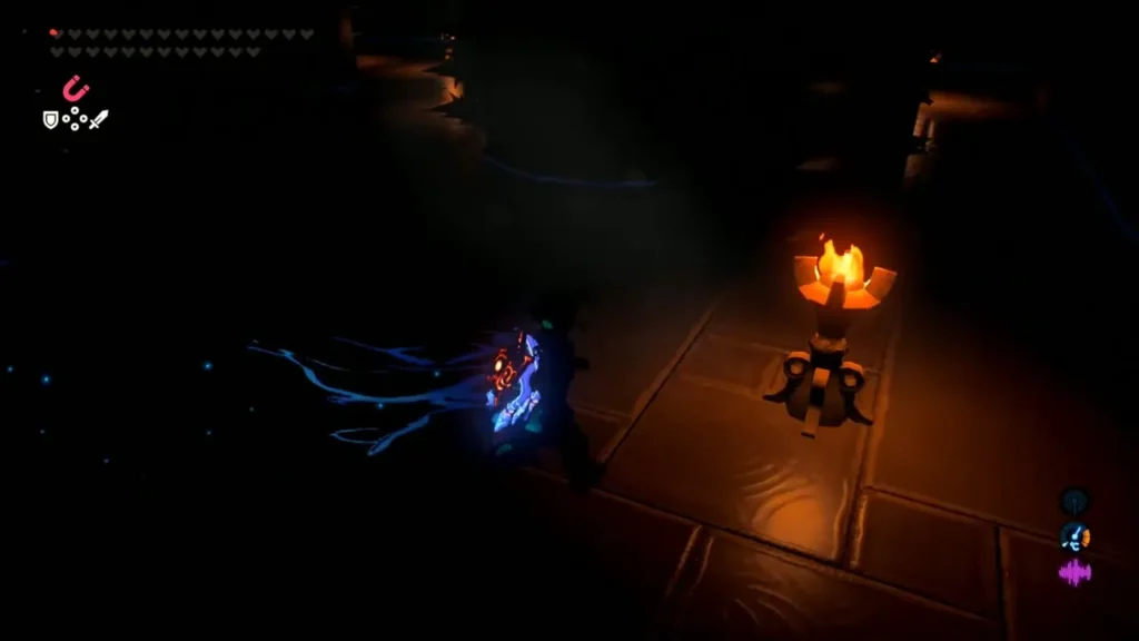 Link running past a lit torch in the spiked wall corridor Link running past a lit torch in the spiked wall corridor
