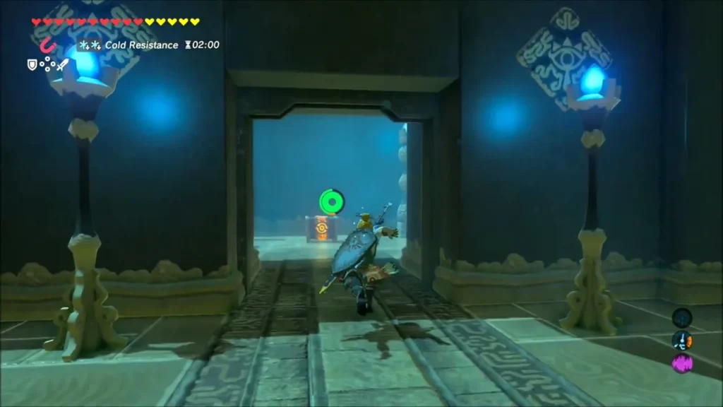 Link runs through the opened gate toward the chest Link runs through the opened gate toward the chest