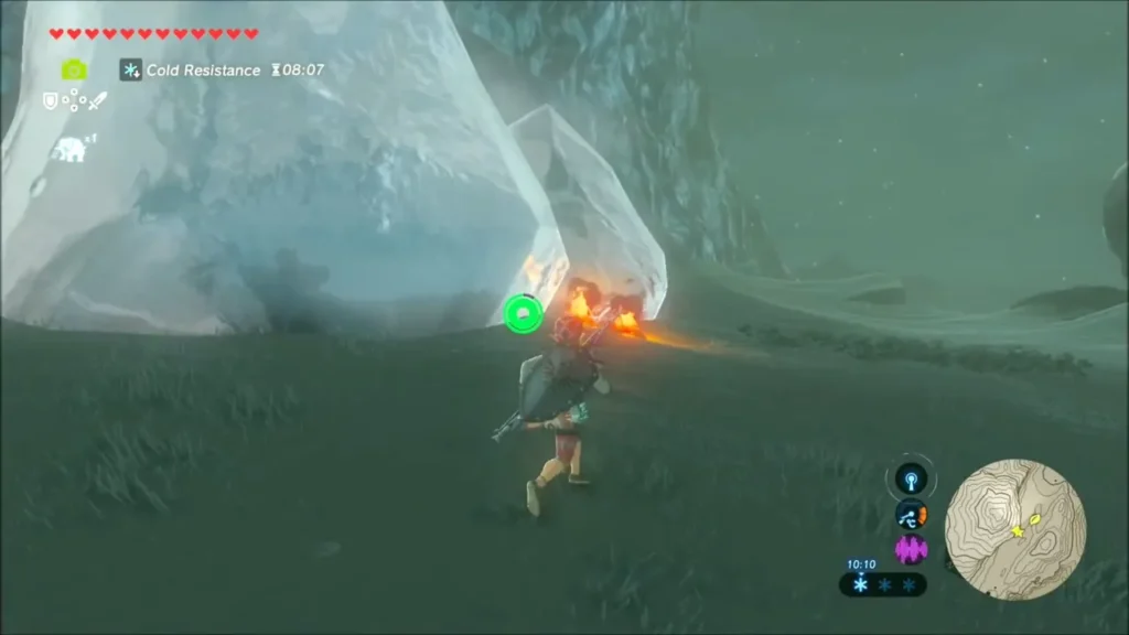 Link running toward a burning ice block on the snowy approach Link running toward a burning ice block on the snowy approach