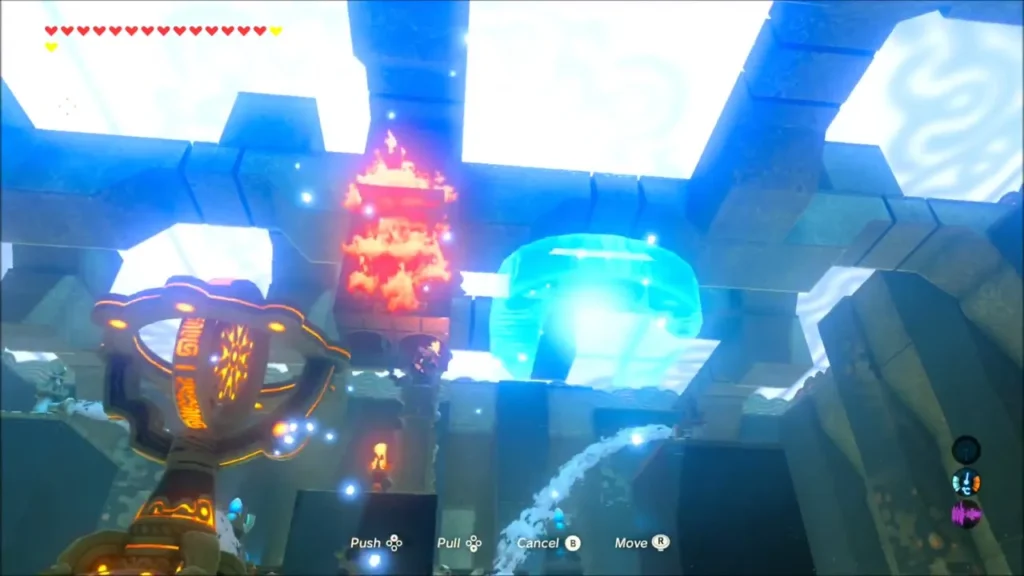 Link using Magnesis on the lantern beside the burning wooden pile Link using Magnesis on the lantern beside the burning wooden pile