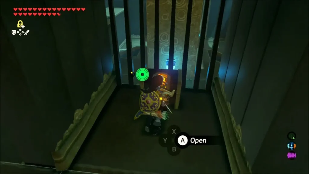 Link opening a chest behind bars in Kaam Ya'tak Shrine Link opening a chest behind bars in Kaam Ya'tak Shrine