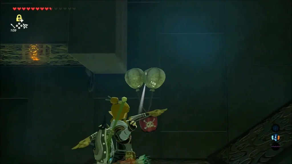 An explosive barrel hanging from two balloons above Link An explosive barrel hanging from two balloons above Link