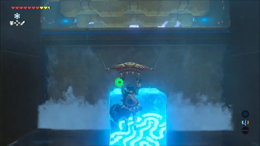 Link gliding down onto an ice block beside the shrine waterfall Link gliding down onto an ice block beside the shrine waterfall