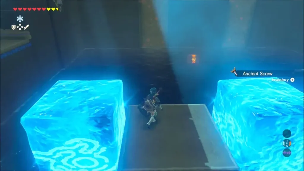 Link standing between two ice blocks on a stone platform over water Link standing between two ice blocks on a stone platform over water