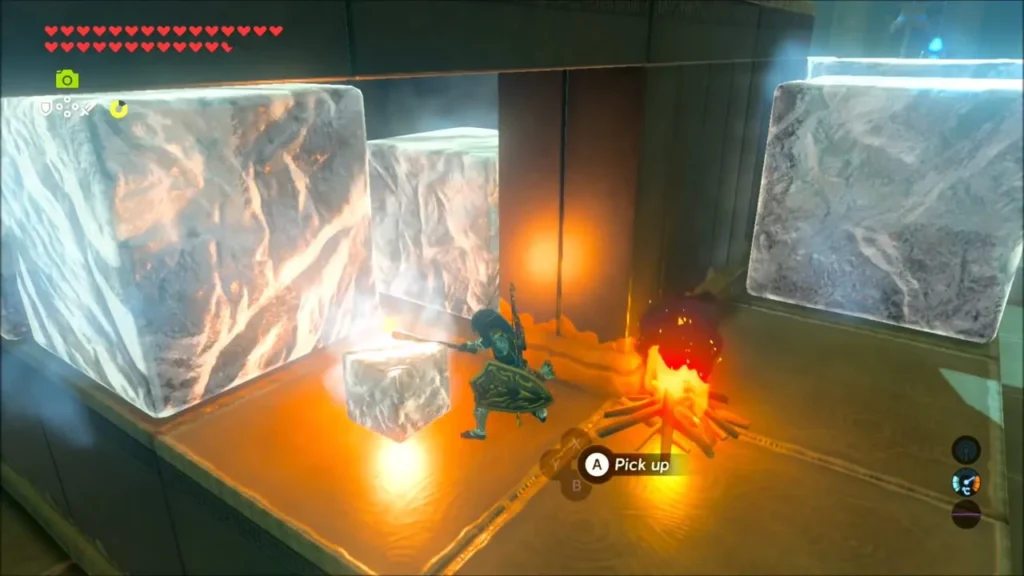 Link melting ice in the alcove under the platform beside a fire Link melting ice in the alcove under the platform beside a fire