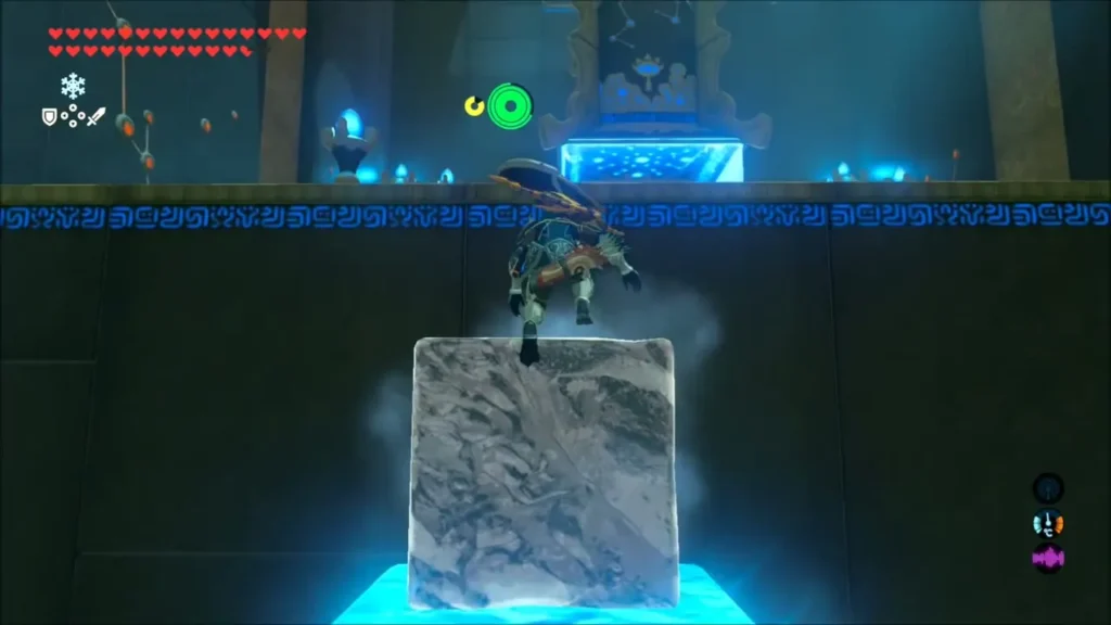 Link climbing from a Cryonis ice block up to the ledge near the monk Link climbing from a Cryonis ice block up to the ledge near the monk
