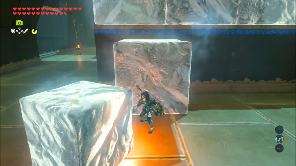 Link holding a torch against ice sealing the ledge between two blocks Link holding a torch against ice sealing the ledge between two blocks