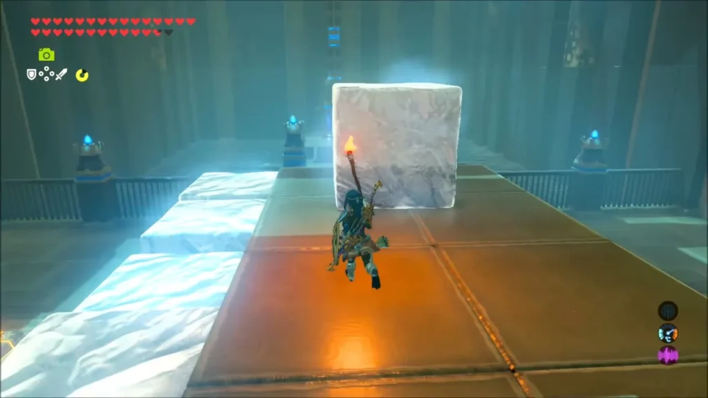 Link raising a torch to the huge ice block Link raising a torch to the huge ice block