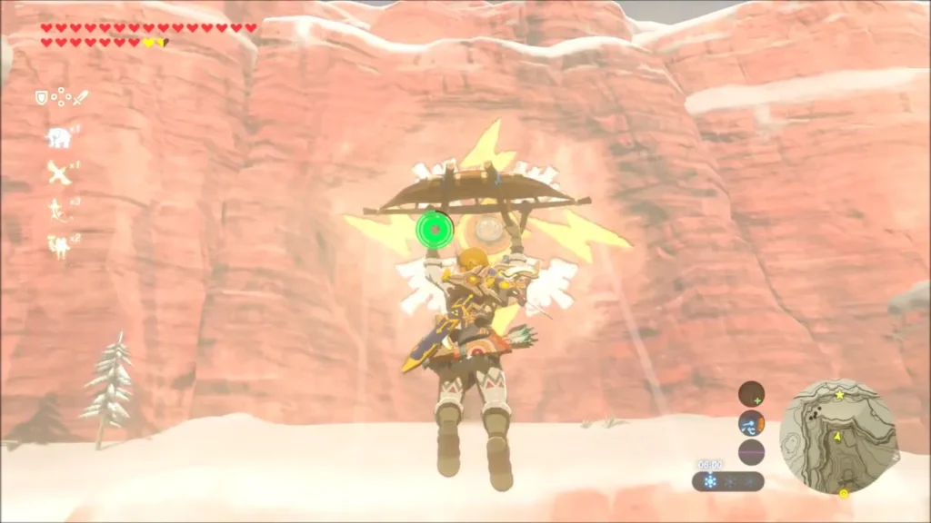 Link gliding toward a red cliff marked with yellow electric symbols Link gliding toward a red cliff marked with yellow electric symbols
