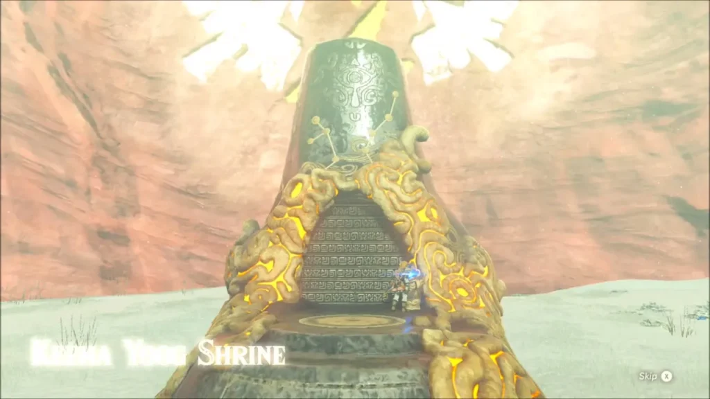 The risen shrine with its entrance open below the red cliff The risen shrine with its entrance open below the red cliff