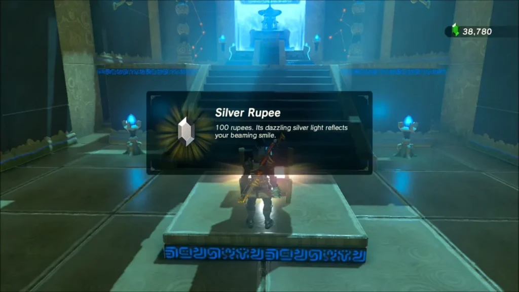 Link getting a Silver Rupee from the chest in Kema Kosassa Shrine Link getting a Silver Rupee from the chest in Kema Kosassa Shrine