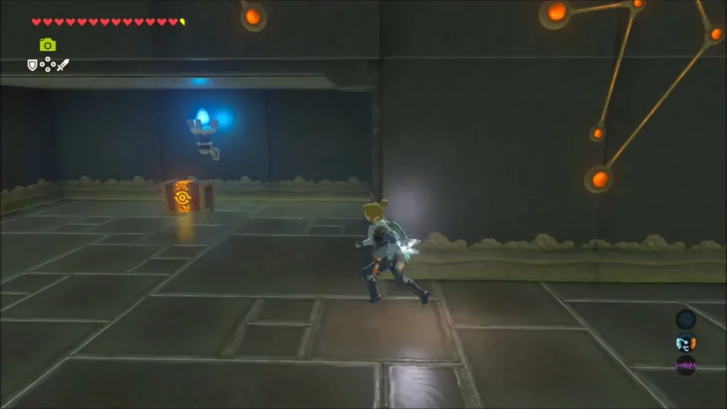Link running toward the open gate with a chest beyond, constellation on the wall Link running toward the open gate with a chest beyond, constellation on the wall