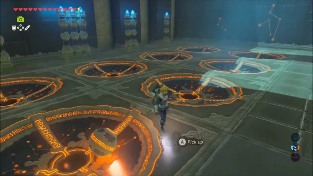 Link beside a sphere at a row of glowing receptacles with torch columns behind Link beside a sphere at a row of glowing receptacles with torch columns behind