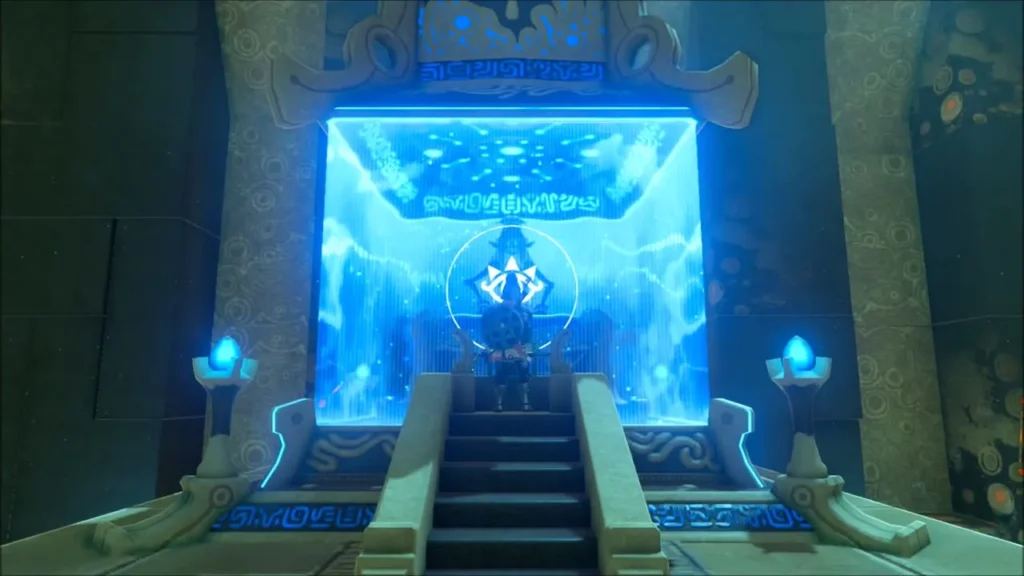 Link standing before the glowing blue shrine door inside Ketoh Wawai Shrine Link standing before the glowing blue shrine door inside Ketoh Wawai Shrine