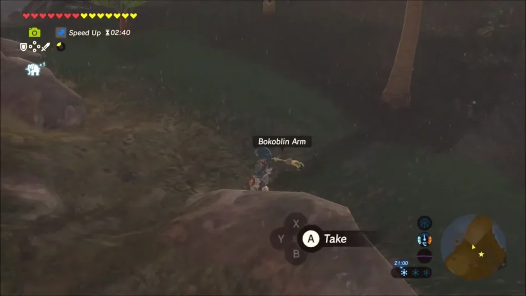 Link picking up a Bokoblin Arm from the ground on the rainy island Link picking up a Bokoblin Arm from the ground on the rainy island