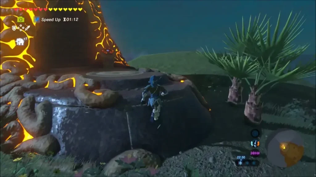 Link climbing the glowing orange base of the shrine tower at night Link climbing the glowing orange base of the shrine tower at night