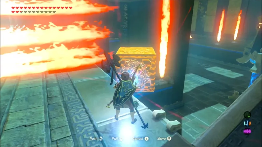 Link behind a metal block beside rows of fire Link behind a metal block beside rows of fire