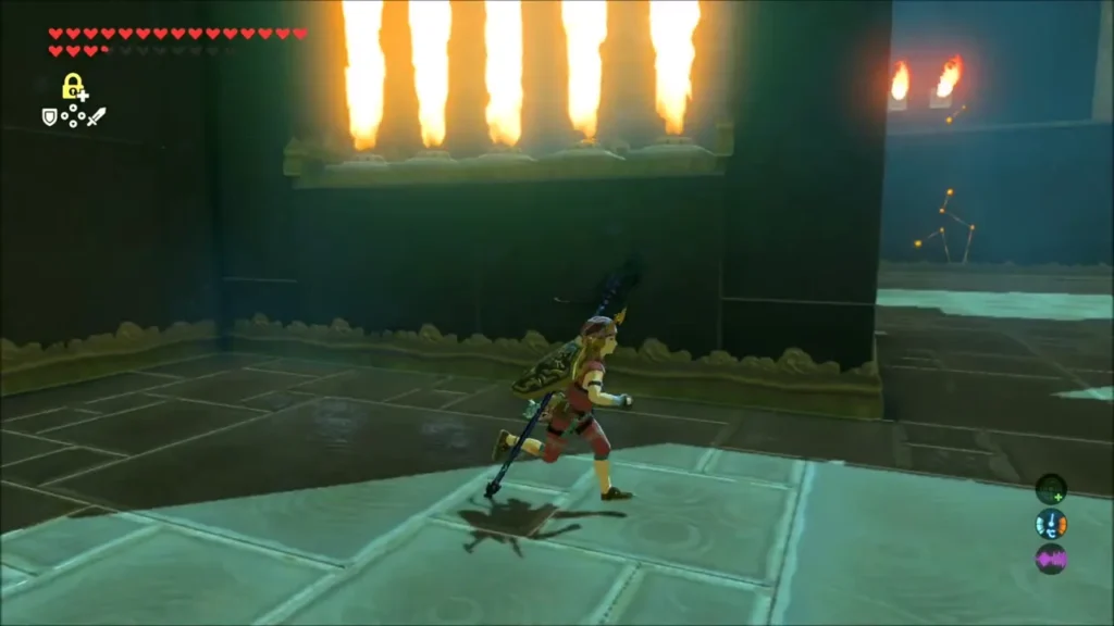 Link running past a row of fire columns in Kuh Takkar Shrine Link running past a row of fire columns in Kuh Takkar Shrine